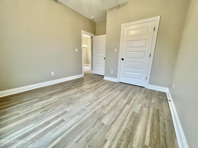 unfurnished bedroom with light hardwood / wood-style floors