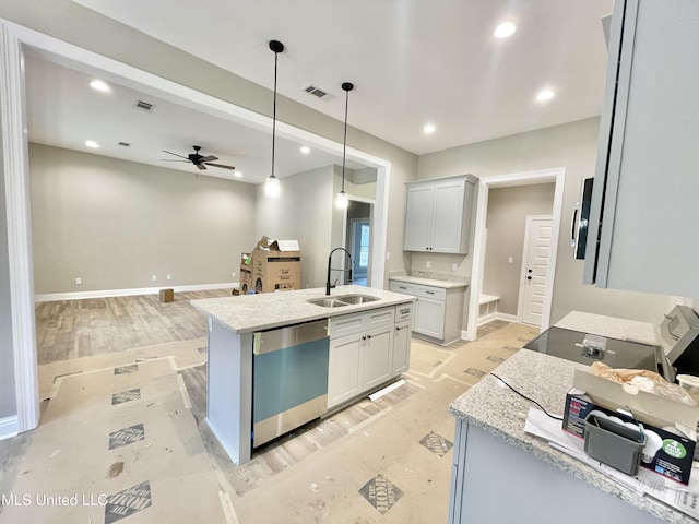 kitchen with sink, dishwasher, a kitchen island with sink, light stone countertops, and decorative light fixtures