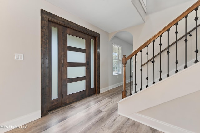 entrance foyer with light hardwood / wood-style floors