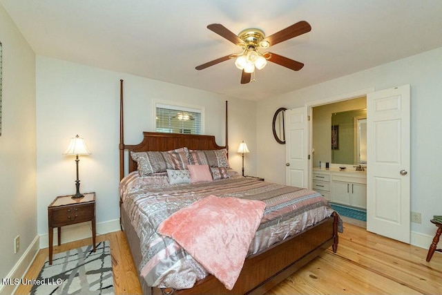 16063 W Daytona Dr, Pearlington, MS 39572 - bedroom featuring baseboards, light wood-style flooring, and a ceiling fan