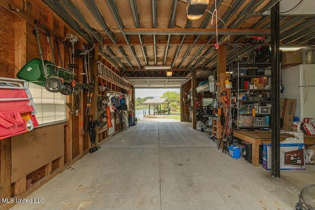 16063 W Daytona Dr, Pearlington, MS 39572 - garage featuring a workshop area