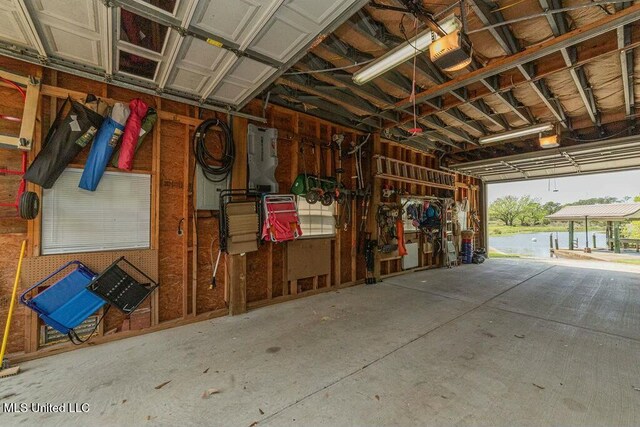 16063 W Daytona Dr, Pearlington, MS 39572 - garage featuring a garage door opener