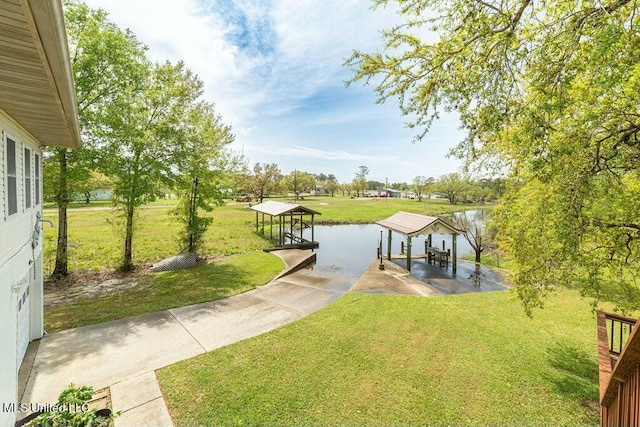 16063 W Daytona Dr, Pearlington, MS 39572 - dock area featuring a water view, a gazebo, and a yard