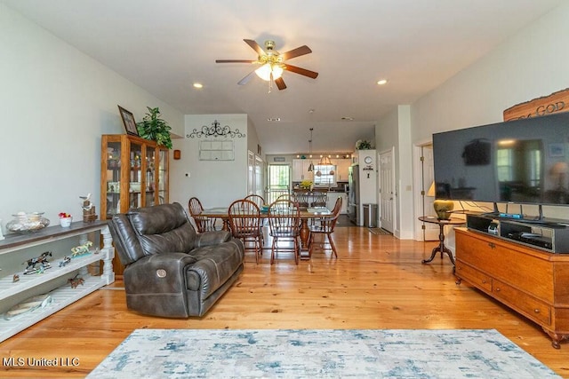 16063 W Daytona Dr, Pearlington, MS 39572 - living area with light wood-type flooring, recessed lighting, and a ceiling fan