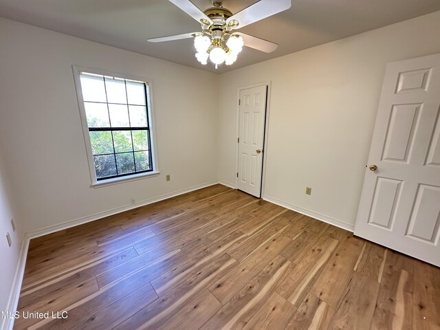 bathroom with toilet, vanity, and bathing tub / shower combination