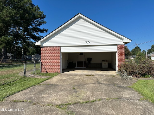 garage with a yard