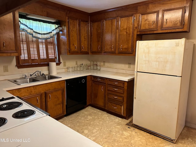 kitchen featuring white appliances and sink