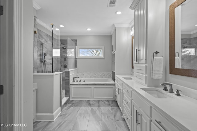 full bathroom featuring a garden tub, a sink, visible vents, a tile shower, and crown molding