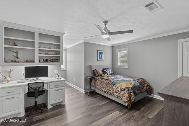 bedroom featuring dark wood-style flooring, crown molding, visible vents, a textured ceiling, and baseboards