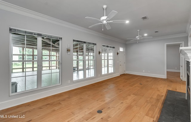 121 Poplar Ridge Dr, Brandon, MS 39047 - unfurnished living room featuring plenty of natural light, ornamental molding, a ceiling fan, baseboards, and recessed lighting