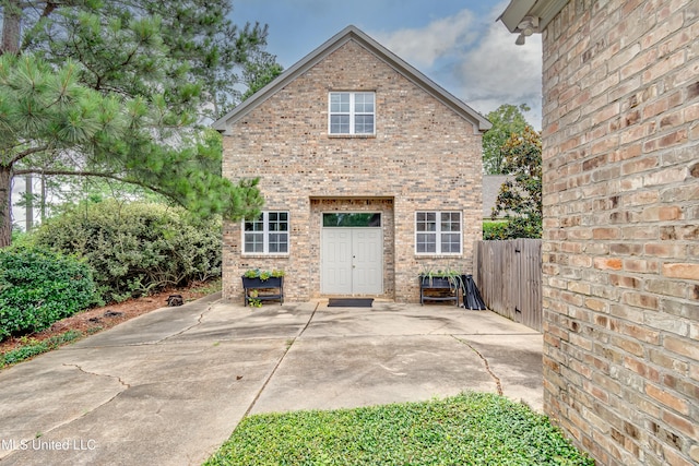 121 Poplar Ridge Dr, Brandon, MS 39047 - back of property with brick siding and a patio