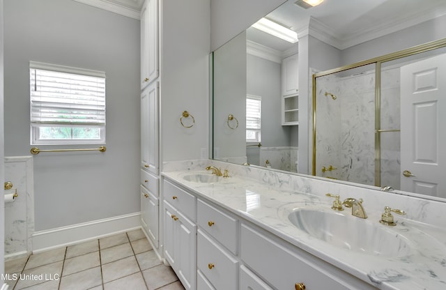 121 Poplar Ridge Dr, Brandon, MS 39047 - bathroom with crown molding, double vanity, a marble finish shower, tile patterned flooring, and baseboards