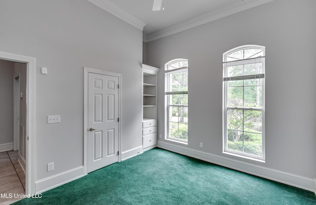 121 Poplar Ridge Dr, Brandon, MS 39047 - unfurnished bedroom featuring ornamental molding, baseboards, carpet floors, and ceiling fan
