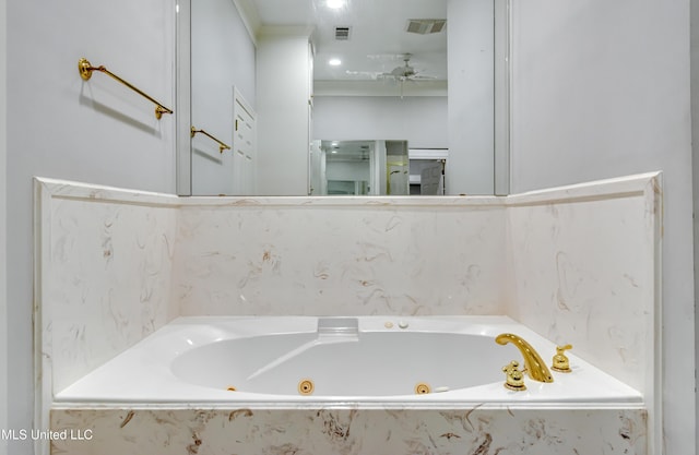 121 Poplar Ridge Dr, Brandon, MS 39047 - bathroom with a jetted tub and a ceiling fan