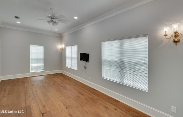 121 Poplar Ridge Dr, Brandon, MS 39047 - unfurnished room featuring ornamental molding, baseboards, ceiling fan, a chandelier, and light wood finished floors