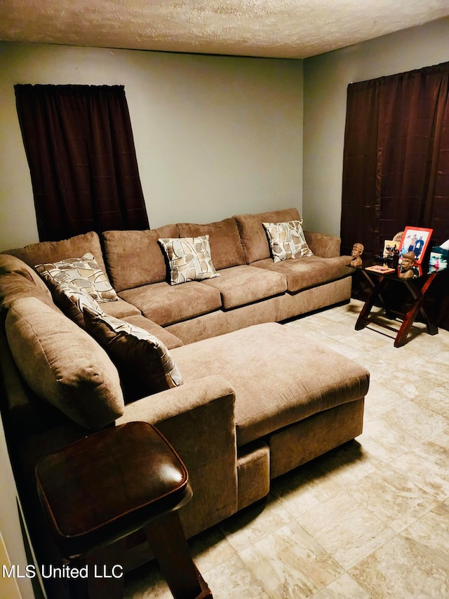 44 E E St, Cruger, MS 38924 - living room with a textured ceiling