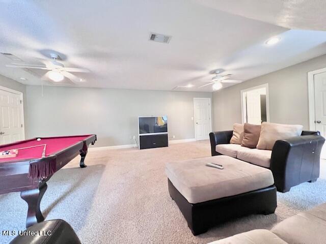 playroom with pool table, light carpet, and ceiling fan