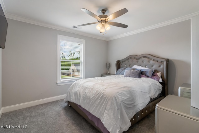 bedroom with crown molding, visible vents, baseboards, and carpet floors