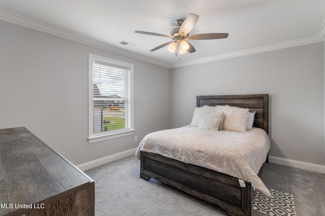 bedroom featuring visible vents, crown molding, and carpet