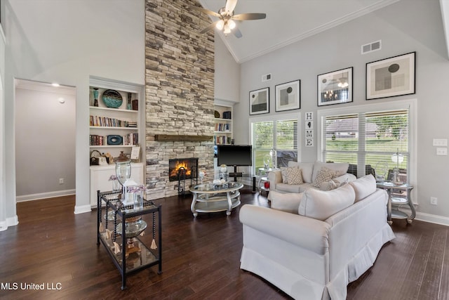 living room with a ceiling fan, baseboards, visible vents, crown molding, and high vaulted ceiling