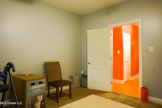 bedroom featuring baseboards and carpet flooring