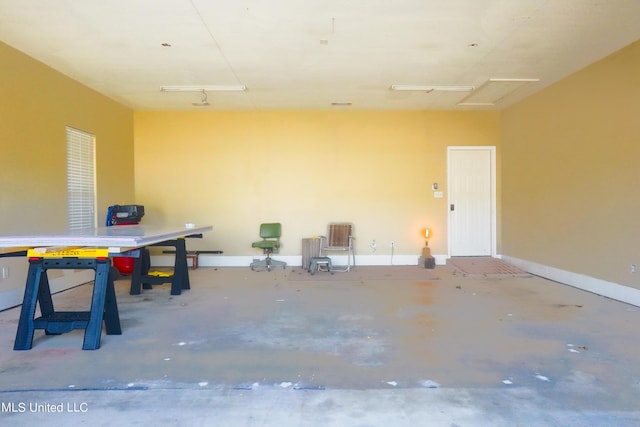 garage with baseboards