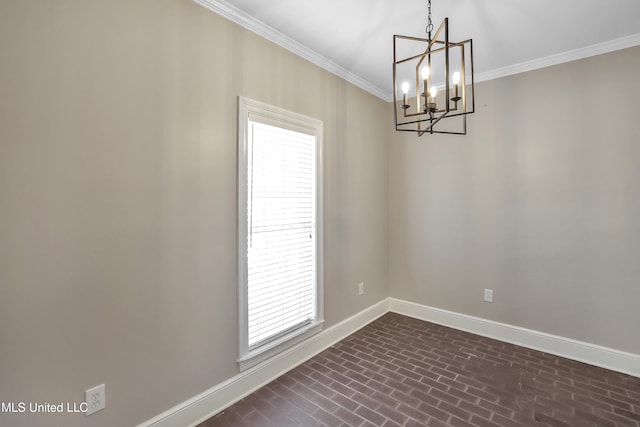 empty room with brick floor, baseboards, a notable chandelier, and crown molding