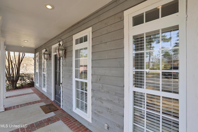 doorway to property featuring a porch