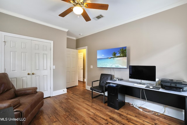 office space featuring visible vents, baseboards, ornamental molding, wood finished floors, and a ceiling fan