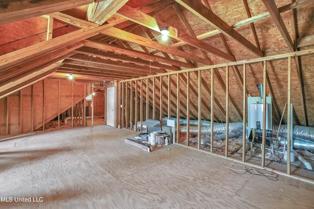 unfinished attic with water heater