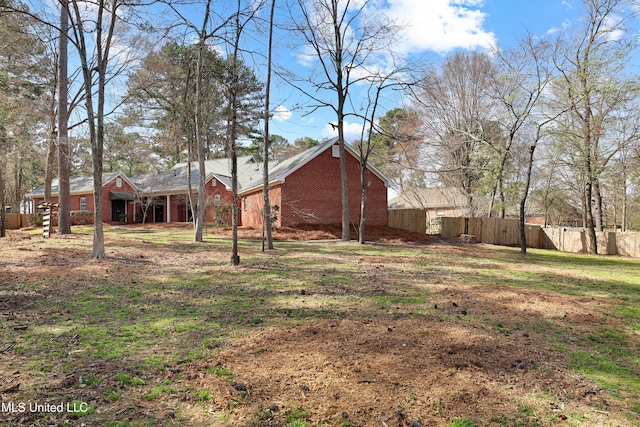 view of yard featuring fence