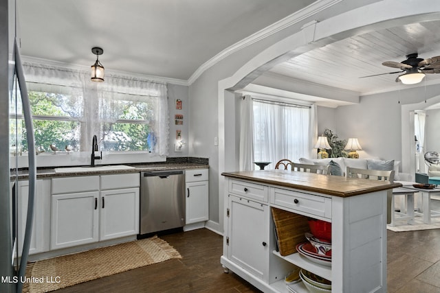 813 42nd Ave, Gulfport, MS 39501 - kitchen with stainless steel appliances, a sink, a ceiling fan, wood counters, and dark wood-style floors