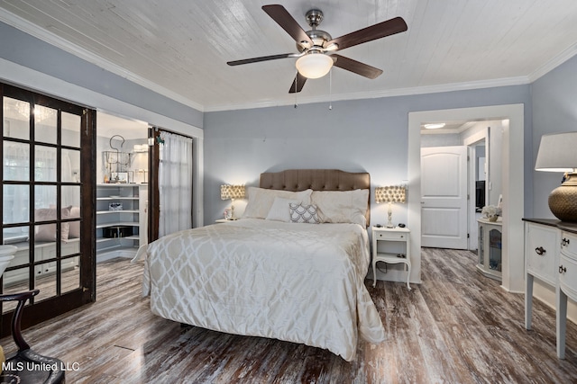 bedroom featuring ornamental molding, hardwood / wood-style floors, wooden ceiling, and ceiling fan