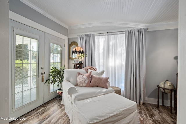 interior space featuring french doors, crown molding, and wood-type flooring