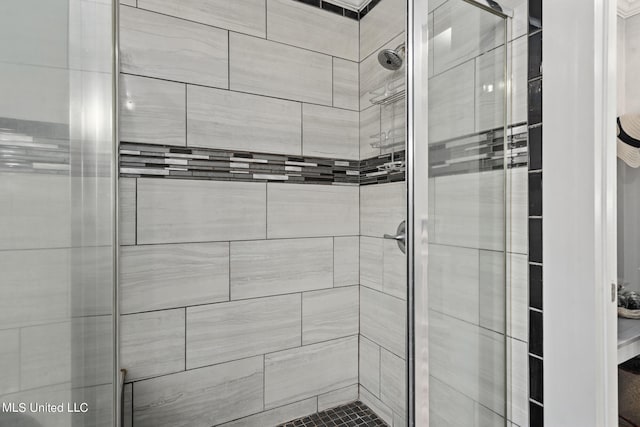 bathroom with an enclosed shower