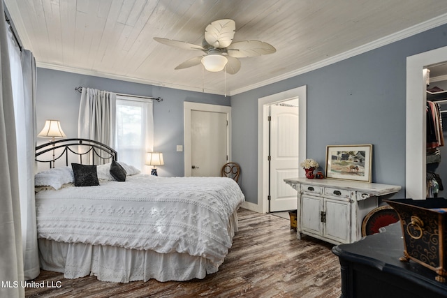 bedroom with wood ceiling, ornamental molding, hardwood / wood-style flooring, and ceiling fan