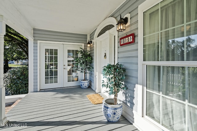 property entrance featuring covered porch