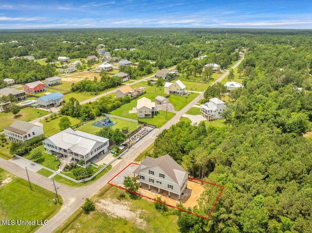 200 Farrar Ln, Waveland, MS 39576 - aerial perspective of suburban area with a forest and property boundaries highlighted