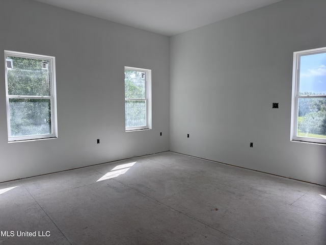 200 Farrar Ln, Waveland, MS 39576 - empty room featuring healthy amount of natural light