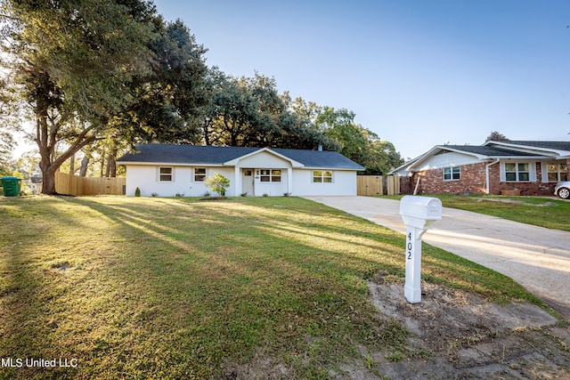 ranch-style home with a front yard