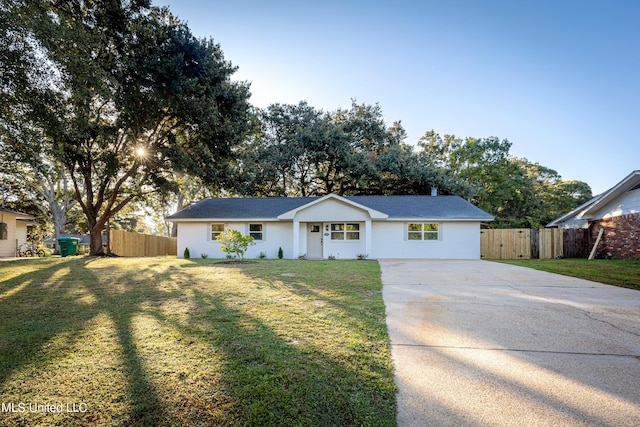 ranch-style house with a front lawn