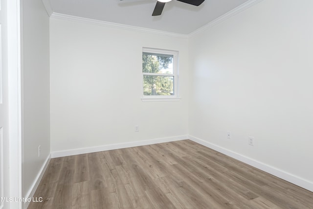 empty room featuring light hardwood / wood-style floors, crown molding, and ceiling fan