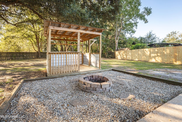 view of patio with an outdoor fire pit