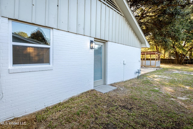 view of home's exterior featuring a yard