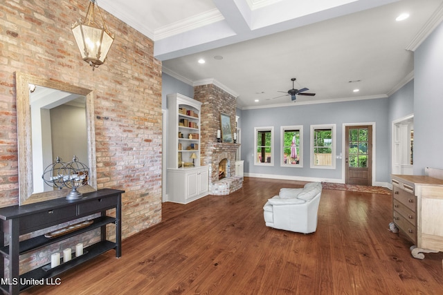 living area with ceiling fan, a large fireplace, recessed lighting, baseboards, and wood finished floors