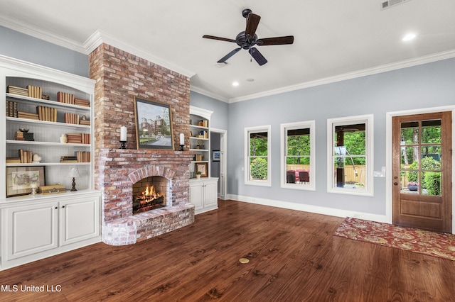 unfurnished living room featuring dark wood finished floors, a brick fireplace, a wealth of natural light, and ceiling fan