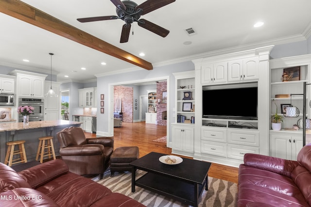 living area with visible vents, a ceiling fan, wood finished floors, and recessed lighting