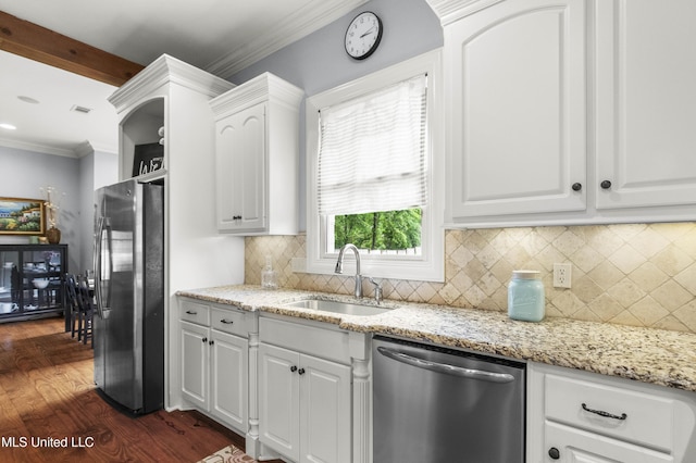 kitchen featuring light stone countertops, a sink, white cabinets, dark wood-style floors, and stainless steel appliances
