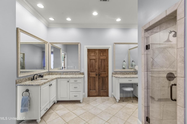 full bath with vanity, ornamental molding, tile patterned flooring, and a stall shower