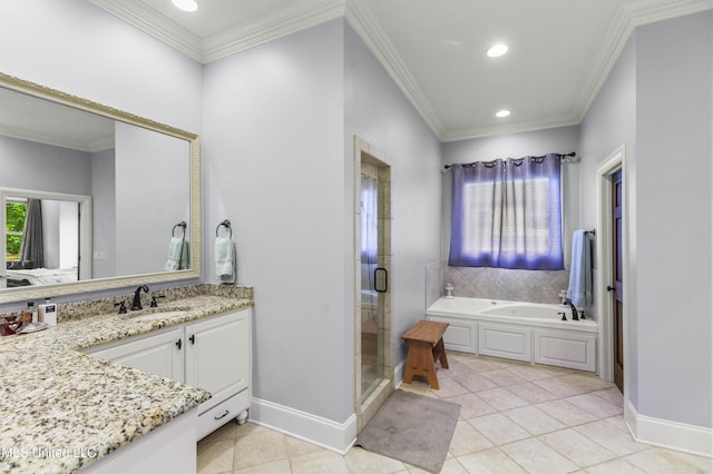 full bath with vanity, crown molding, baseboards, a bath, and tile patterned floors